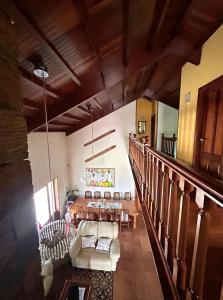 a large living room with a table and chairs at Casa abuelo Ramón in Narón