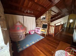 an aerial view of a living room with a bed at Casa abuelo Ramón in Narón