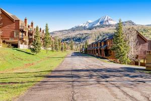 an empty road with a mountain in the background at Cascade 347 in Durango Mountain Resort