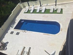 an overhead view of a swimming pool in a backyard at Apartment Jasmina in Krimovice