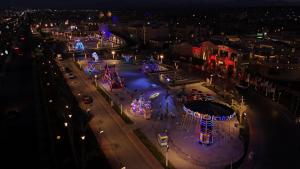 an aerial view of a city at night at Pickalbatros Aqua Blu Resort - Hurghada in Hurghada