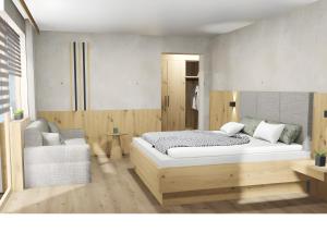 a bedroom with a bed and a chair at Haus Kropfa in Hippach