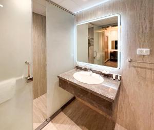 a bathroom with a sink and a mirror at Beirut Hotel Cairo in Cairo +74 photos