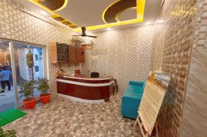 a lobby with a reception desk in a building at EESHA Beach View Stay - Near Temple and Beach in Rāmeswaram