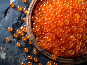 a bowl full of orange balls on a table at Livemax Resort Hachimantai Forest in Hachimantai +104 photos