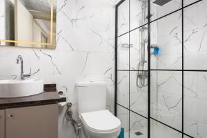 a bathroom with a toilet and a sink at Taksim Peradise Hotel in Istanbul +37 photos