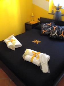 Tempat tidur dalam kamar di Yellow Butterfly House Holiday