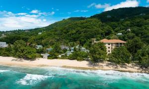 an aerial view of a resort on a beach at Le Bonheur Villa in Victoria