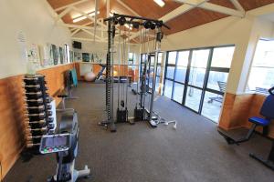 a gym with treadmills and machines in a building at warm, quiet and convenient ! in Auckland
