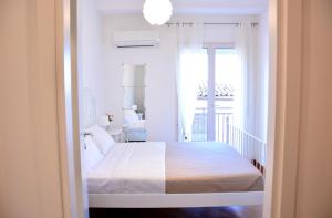 Postel nebo postele na pokoji v ubytování Sui tetti b&b