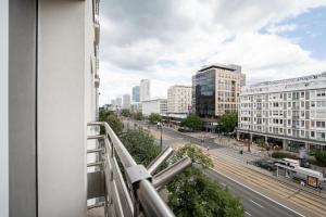 a view of a city street from a building at Labo Apartment - apartamenty Plac Konstytucji in Warsaw