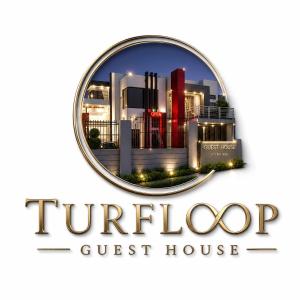 a round logo for a guest house at Turfloop guest house in Ga-Mothapo