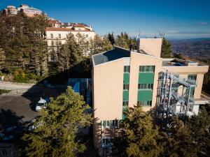 an aerial view of a building with trees at Viva Campus di GM Industries srl in Ferrazzano
