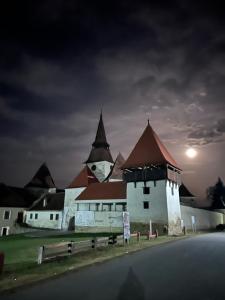 a large white building with two towers on top of it at Archita 155 in Archita +7 photos