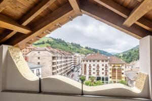 a view from a window of a city at Hotel Truita in Cangas del Narcea