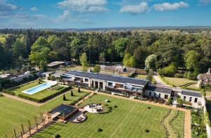 an aerial view of a house with a large yard at The Walled Garden House Rooms Only Not Entire House in Mundford