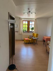a living room with a couch and a table at Gästehaus Klausenhof in Klausen
