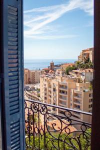 a view of a city from a balcony at My Residence d'Azur in Beausoleil +227 photos