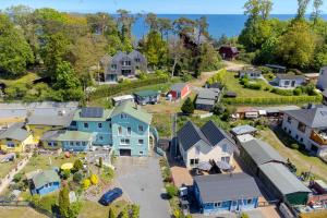 an aerial view of a small town with houses at Haus Füürtoorn mit Fass-Sauna in Loddin