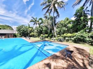 an image of a swimming pool at a house at Manzini Chalet no20 in St Lucia