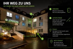 a flyer for a hotel at night with green lights at Moderne Appartement in Nuremberg