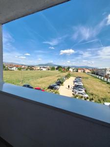 a view from a window of a parking lot at Apartment Stup Sarajevo in Sarajevo +3 photos
