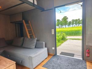 Galeriebild der Unterkunft Tiny House mit Kaminofen & Terrasse direkt an Naturteichen - bis 5 Personen - Für Kurzentschlossene in Großharthau