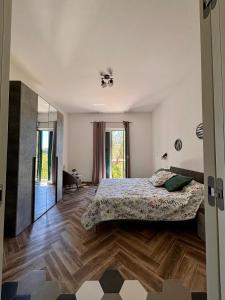 a bedroom with a bed and a mirror at Da Feny in Massa Lubrense