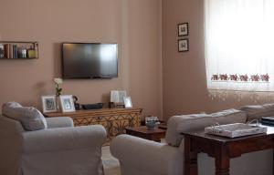 TV a/nebo společenská místnost v ubytování Villa Kate