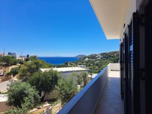 a balcony with a view of the ocean at Vromolithos View House in Vromolithos