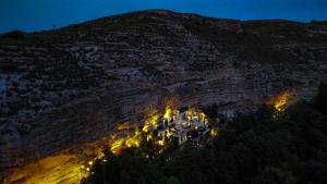 a group of lights on a mountain at night at XUQ Hotels Lomas de Ruvira in Jorquera