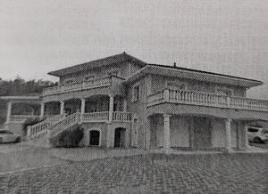 a black and white photo of a house at Jardhelena in Jardin