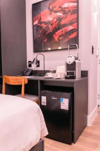 Cama ou camas em um quarto em Ruby Hotels