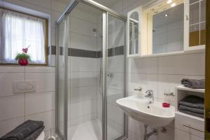 a bathroom with a shower and a sink at Appartements Rosmarie Hollaus in Fügenberg +40 photos