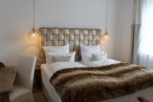Ein Bett oder Betten in einem Zimmer der Unterkunft Spreewaldresort Seinerzeit