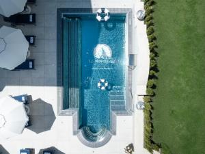 an overhead view of a fountain in a building at Le Mirabeau Resort & Spa in Zermatt +105 photos