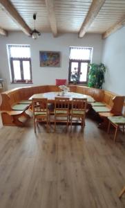 a large living room with a table and chairs at Farma Dolní Dvořiště in Dolní Dvořiště