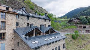 an image of a building with a roof at Hotel Ransol in El Tarter