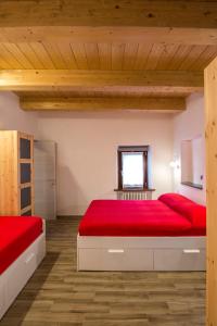 Katil atau katil-katil dalam bilik di Agriturismo Amargi