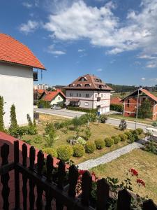 a view from the balcony of a house at Apartmani Rada in Zlatibor