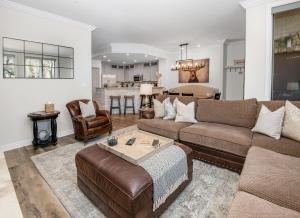 a living room with a couch and a table at Highlands Slopeside in Beaver Creek