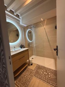a bathroom with a shower and a sink at Clos Lavaux in Châtenay +45 photos