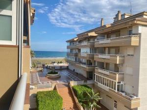 a large apartment building with a view of the ocean at Terra marina in Grao de Castellón