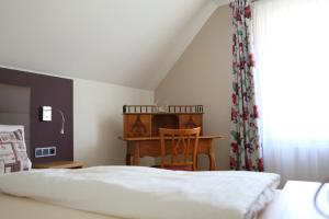 Postel nebo postele na pokoji v ubytování Genießerhotel Limbacher