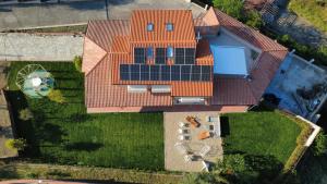 an overhead view of a house with solar panels on its roof at Smack Home Sanremo in Sanremo