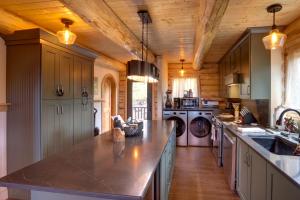 a kitchen with a large counter top in a house at Durango Mountain Escape w/ Stunning Views in Durango +28 photos