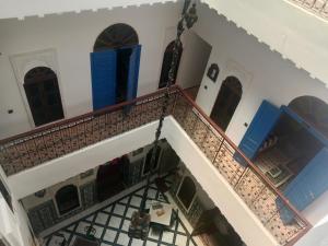 an overhead view of a staircase in a building at Riad la Fíbula de Nora in Fez