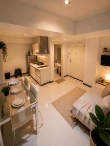a large living room with a couch and a table at Azure Urban Resort Residences by Value Suites in Manila