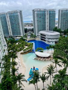 an aerial view of a resort with a pool at Azure Urban Resort Residences by Value Suites in Manila +6 photos