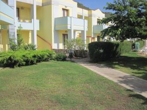 A garden outside Hotel Isola Rossa